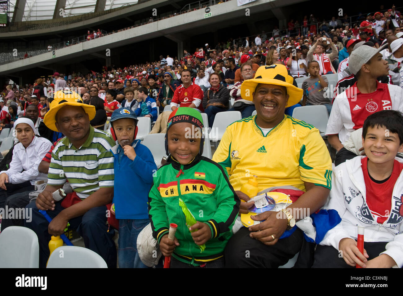 Football supporters in Cape Town Stadium, Cape Town, Western Cape, South Africa Stock Photo