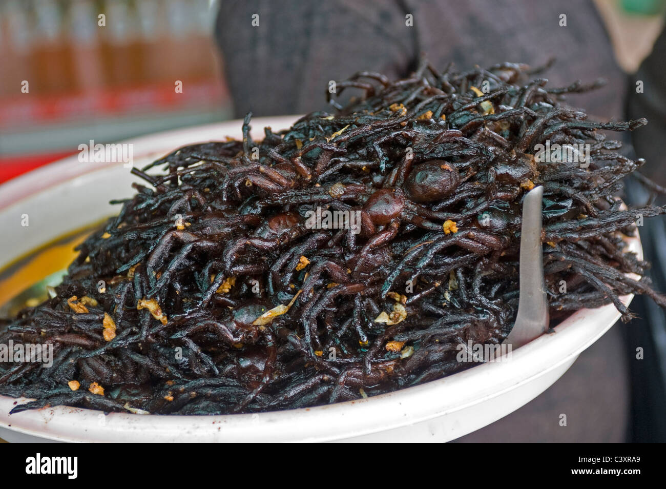 A bowl of spiders for sale Stock Photo Alamy