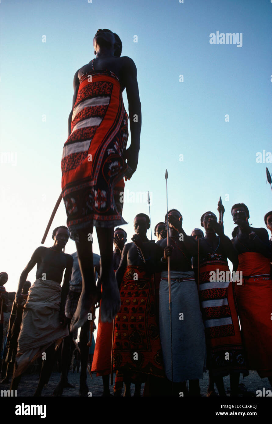 El Molo Warriors and tribal people dance during the Hippopotamus Ceremony. Lake Turkana - Kenya. Stock Photo