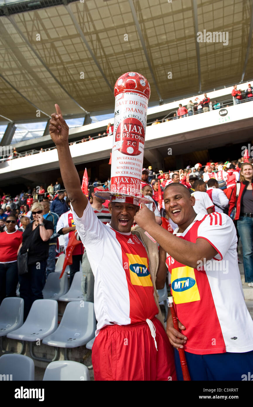 Supporters of Ajax Cape Town Football Club in Cape Town Stadium, Cape Town, Western Cape, South Africa Stock Photo