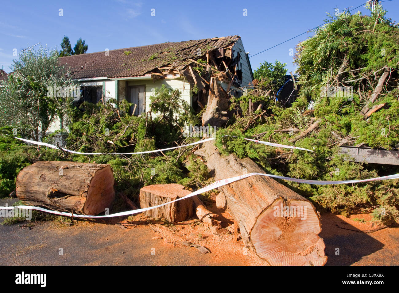 A house in Roseberry Road with damage caused by the tornado on the North Shore, Auckland Stock Photo