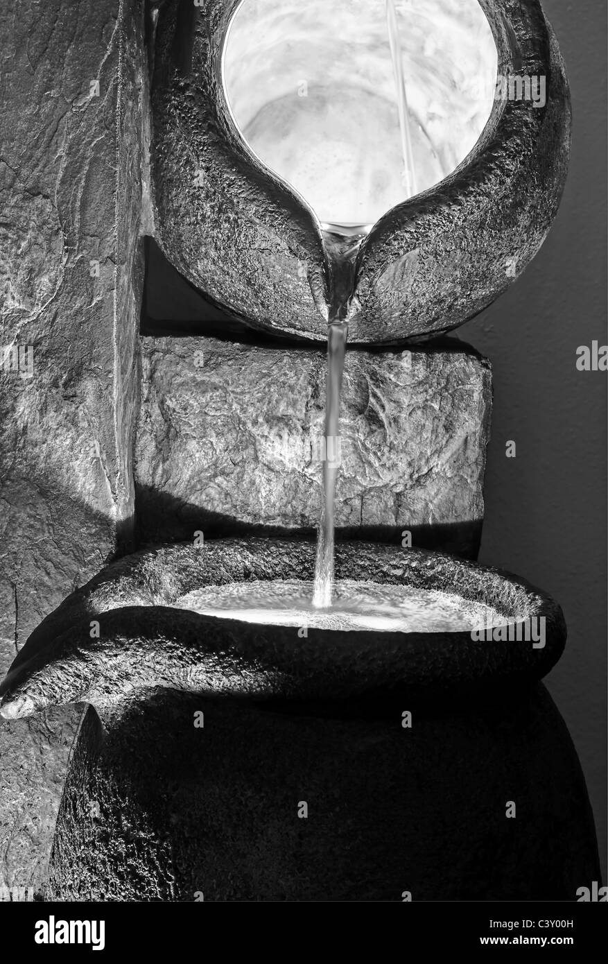 Water pouring from pots Black and White Stock Photos & Images Alamy