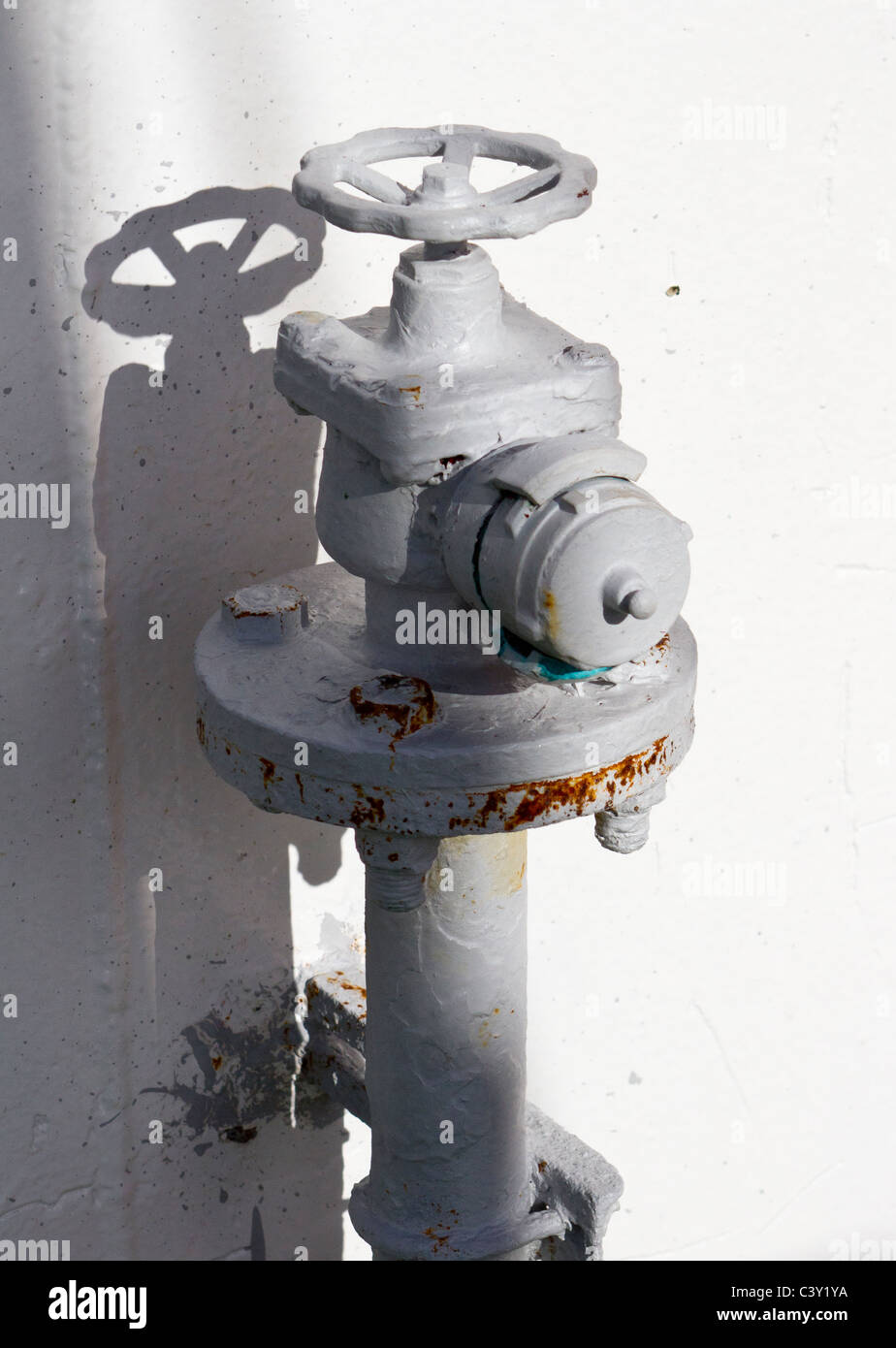A white-painted hydrant on the Picton ferry in New Zealand Stock Photo