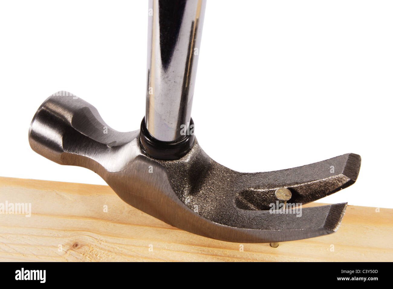 A claw hammer head with nail Stock Photo Alamy