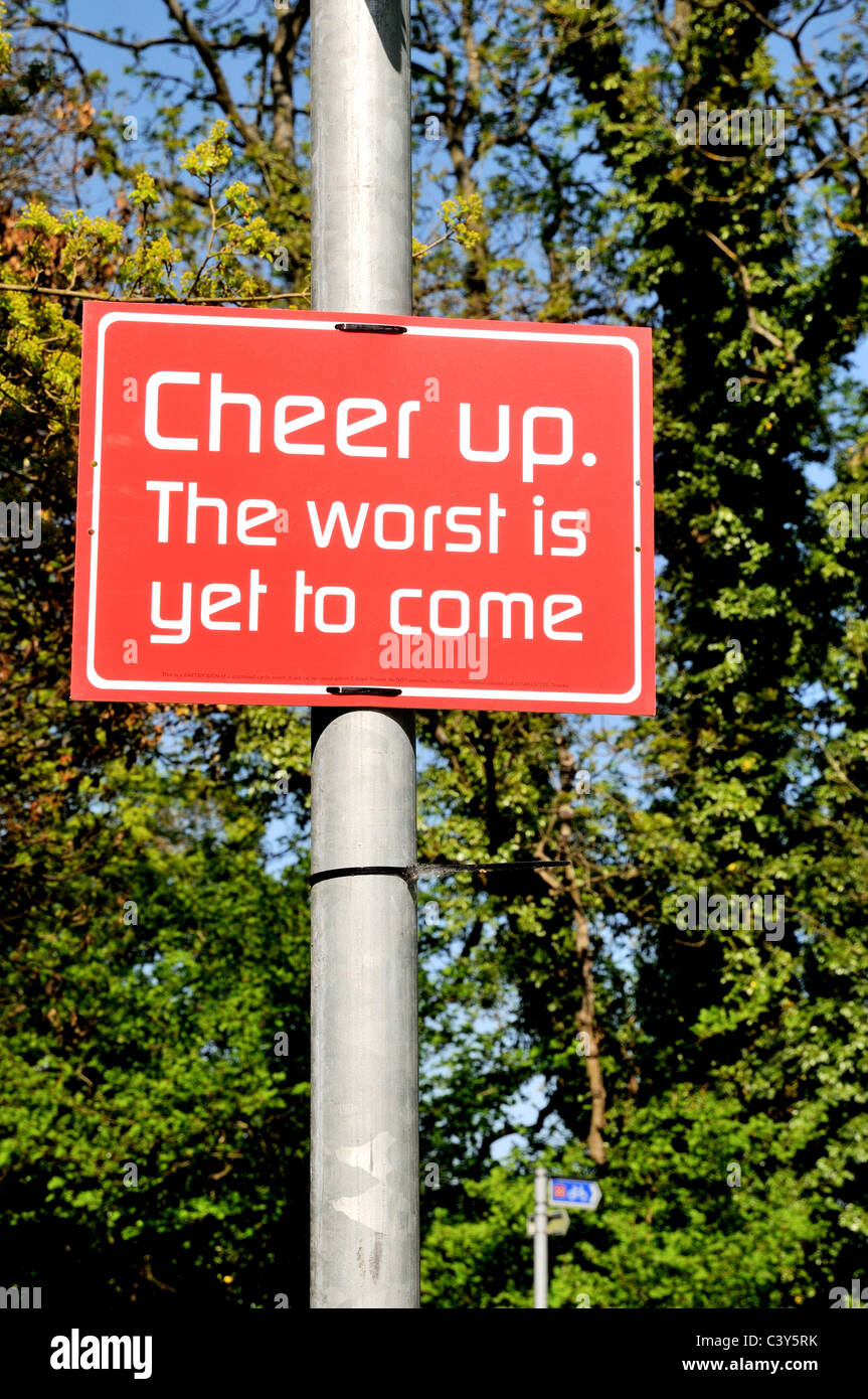 sign-the-worst-is-yet-to-come-on-lamp-po