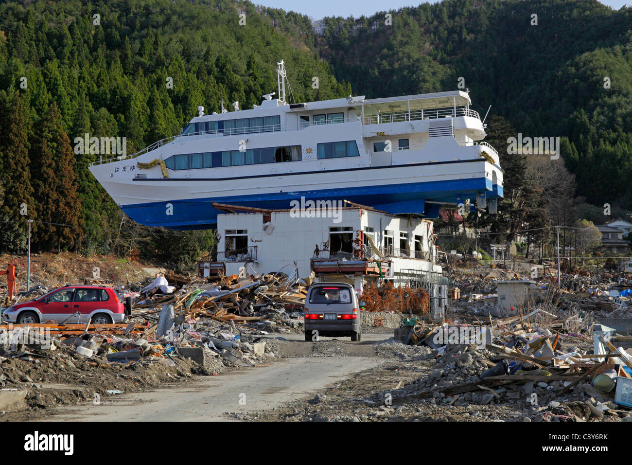 A sightseeing boat left on top of building afterTsunami wave gone Otsuchi-cho town Iwate Japan Stock Photo