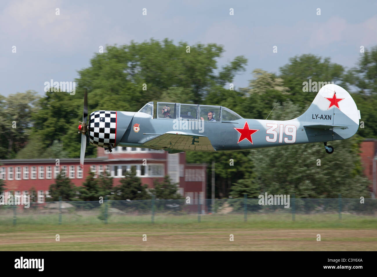 airplane Yak 52 at an airfield festival in Lower Saxony, Germany Stock Photo