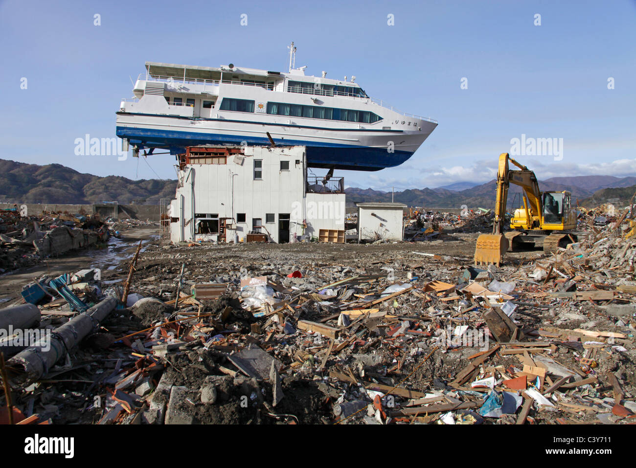 A sightseeing boat left on top of building afterTsunami wave gone ... A sightseeing boat left on top of building afterTsunami wave gone ...