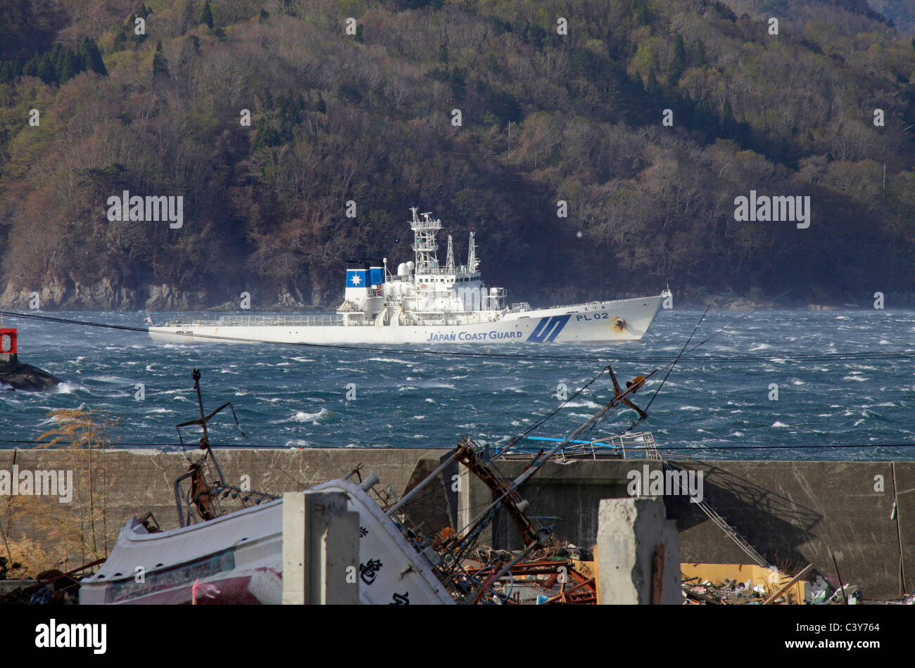 Japan Coast Guard ship PL-02 Erimo stays offshore Otsuchi-cho town Iwate Japan Stock Photo