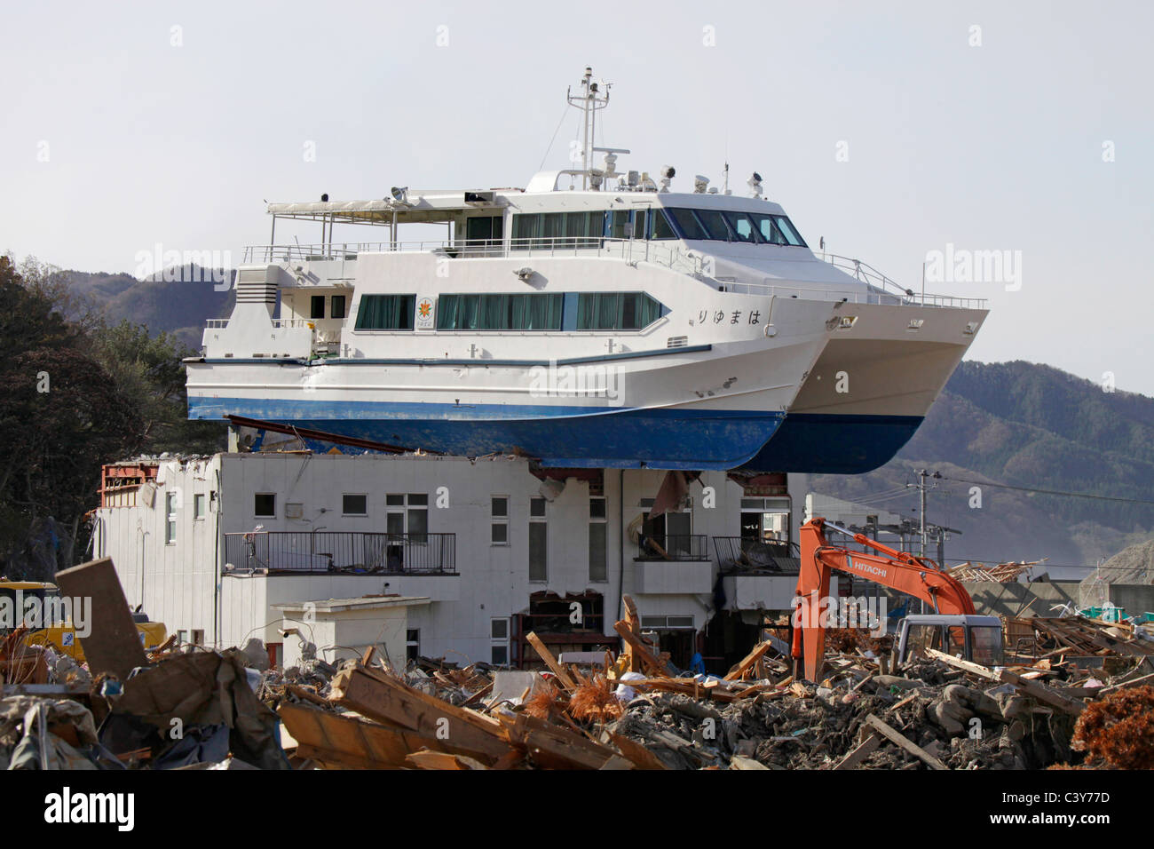 A sightseeing boat left on top of building afterTsunami wave gone ... A sightseeing boat left on top of building afterTsunami wave gone ...