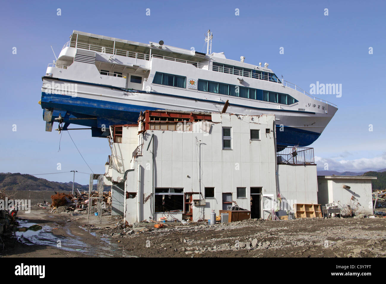 A sightseeing boat left on top of building afterTsunami wave gone ... A sightseeing boat left on top of building afterTsunami wave gone ...