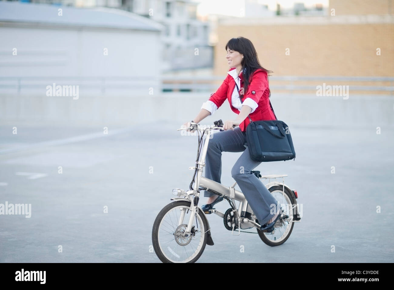 Woman riding a bicycle Stock Photo