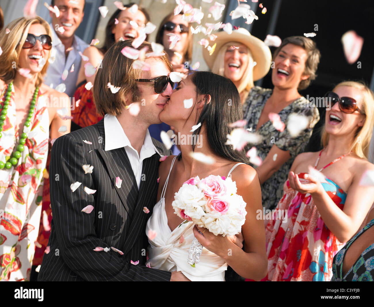 Freshly married couple kissing Stock Photo
