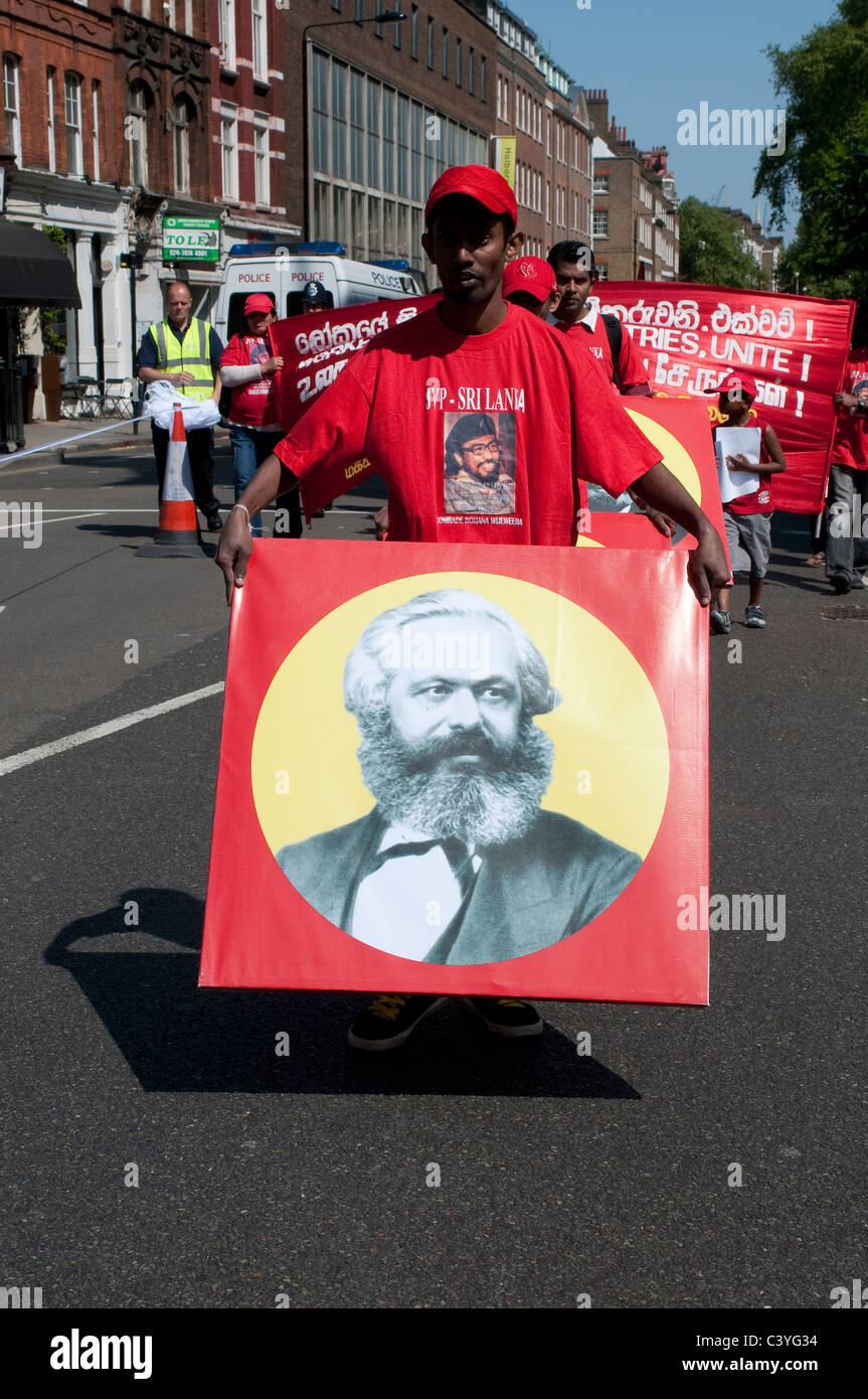 May Day Parade, Tamil Sri Lanka Communist Party with picture of Karl Marx, Theobalds Road, London, UK, 2011 Stock Photo