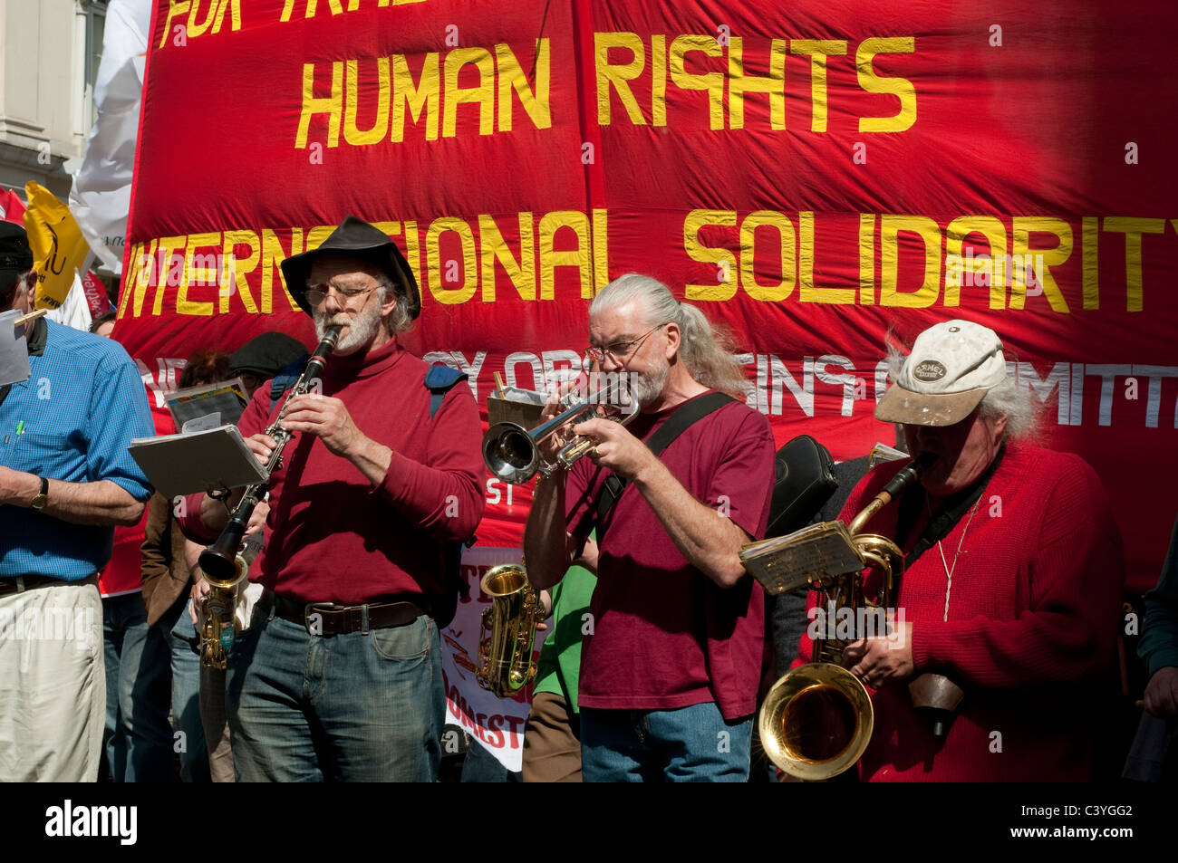 May Day Parade, The Big Red Band leading the march, London, UK, 2011 Stock Photo