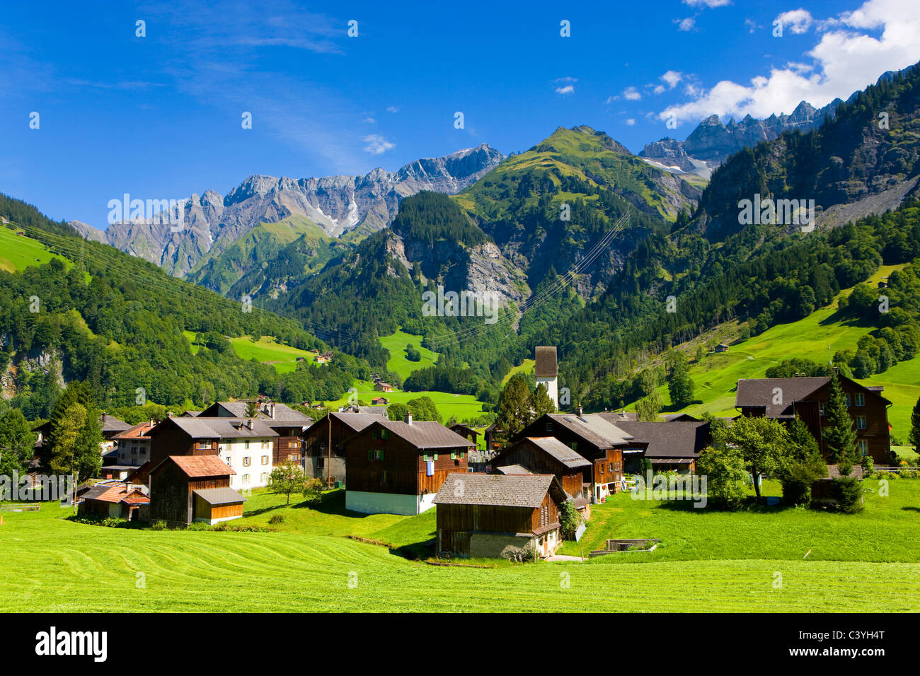 Elm, Switzerland, canton Glarus, village, houses, homes, church, mountains Stock Photo