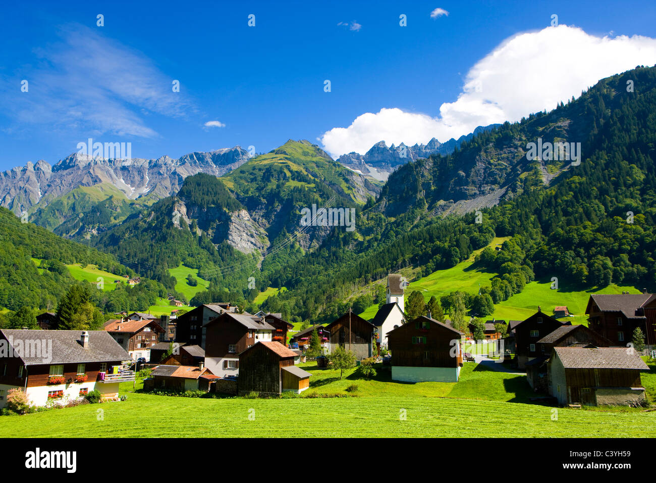 Elm, Switzerland, canton Glarus, village, houses, homes, church, mountains Stock Photo