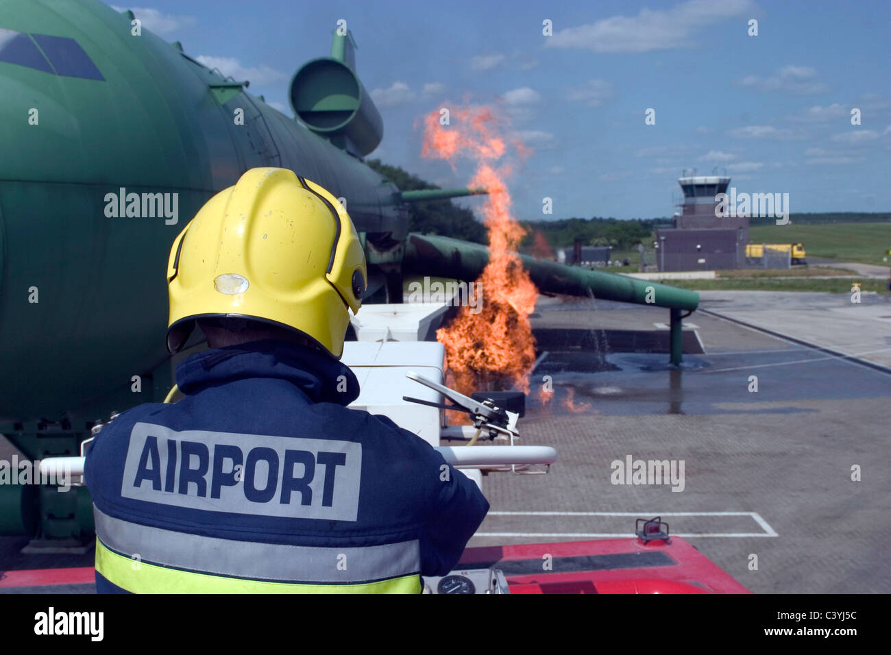Firefighters tackle simulated aircraft engine fire Stock Photo