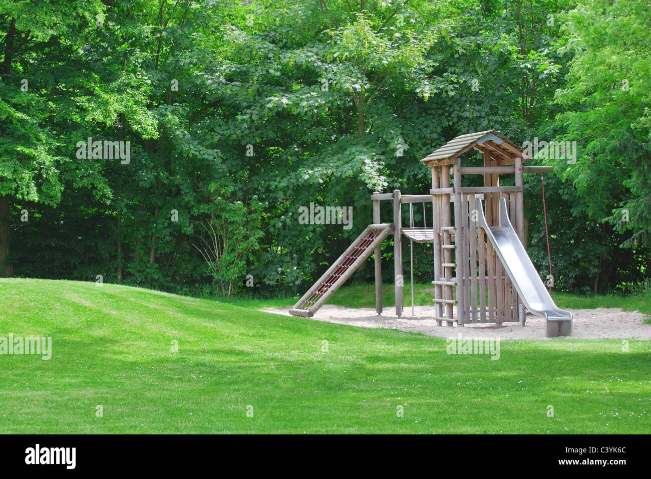 playground in a city park Stock Photo Alamy