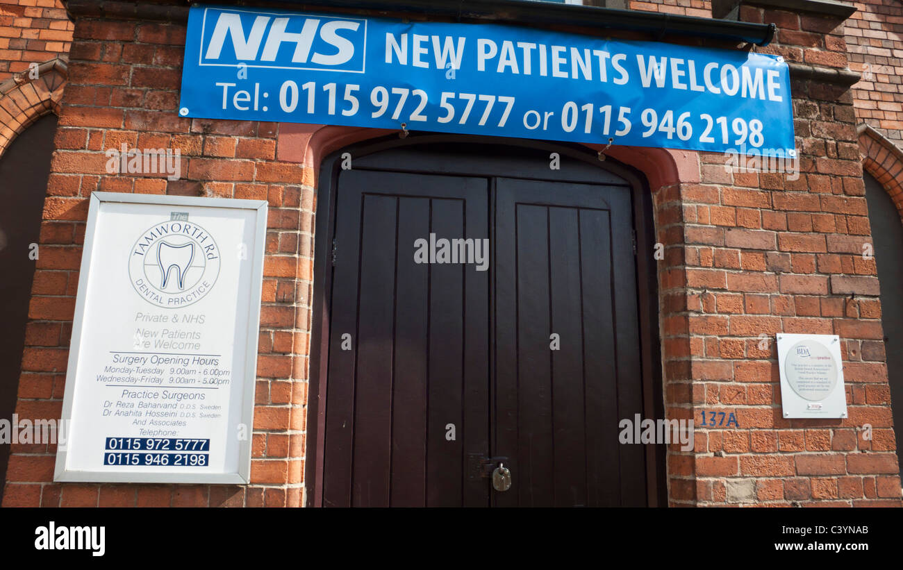 NHS dentists displaying sign inviting New patients Welcome to register at the dental practice Stock Photo