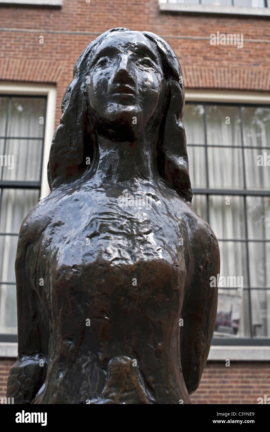 Statue of Anne Frank, in the Westermarkt area of Amsterdam, Netherlands Stock Photo