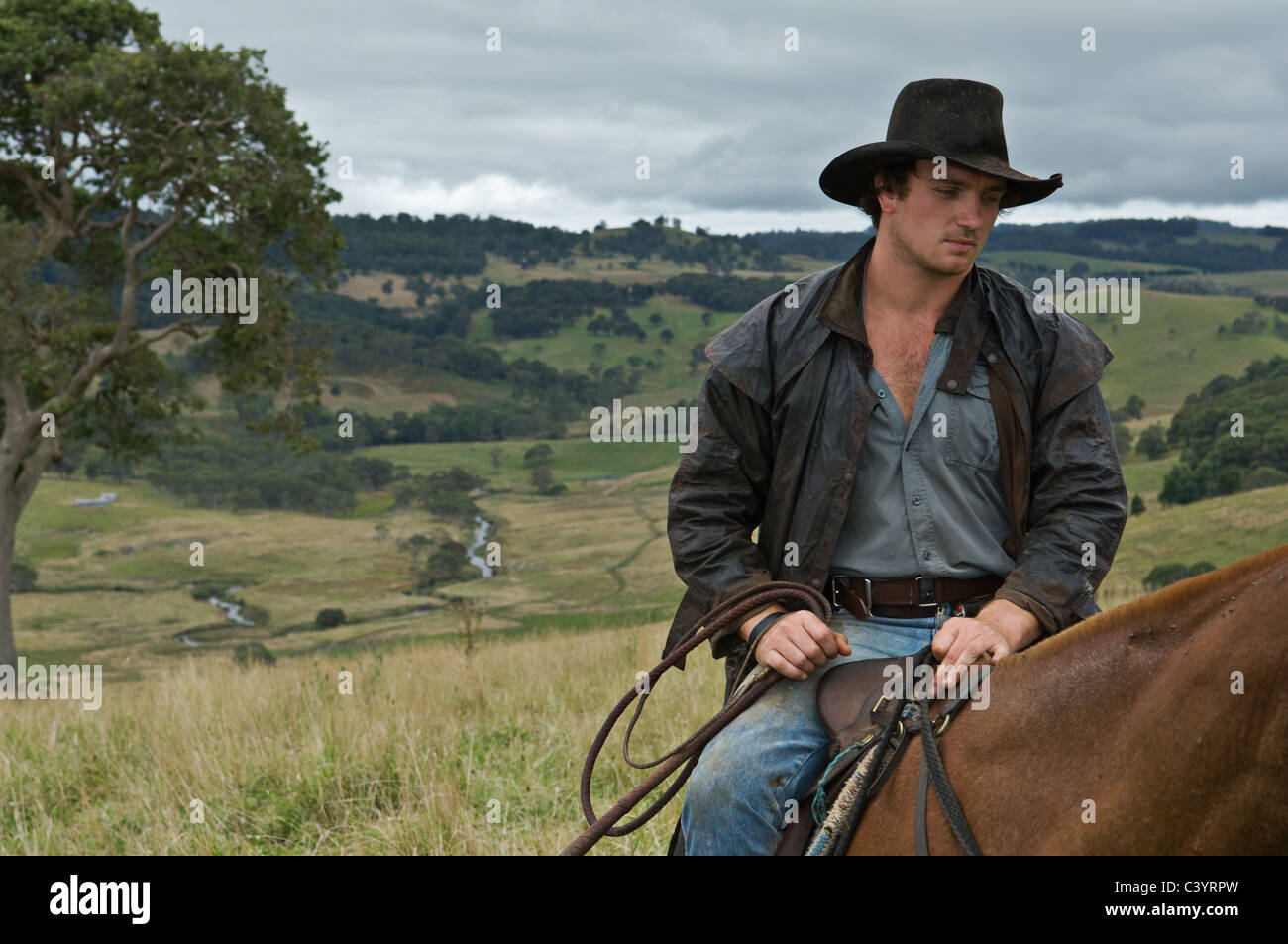 Man on horse in countrside Stock Photo - Alamy