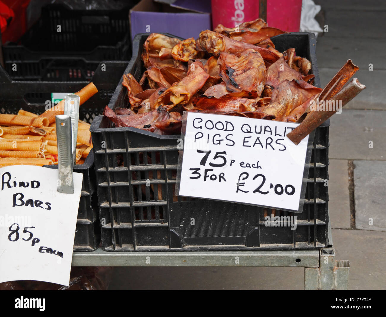 Cooked Pigs ears on Dog food market stall in England, United Kingdom Stock Photo