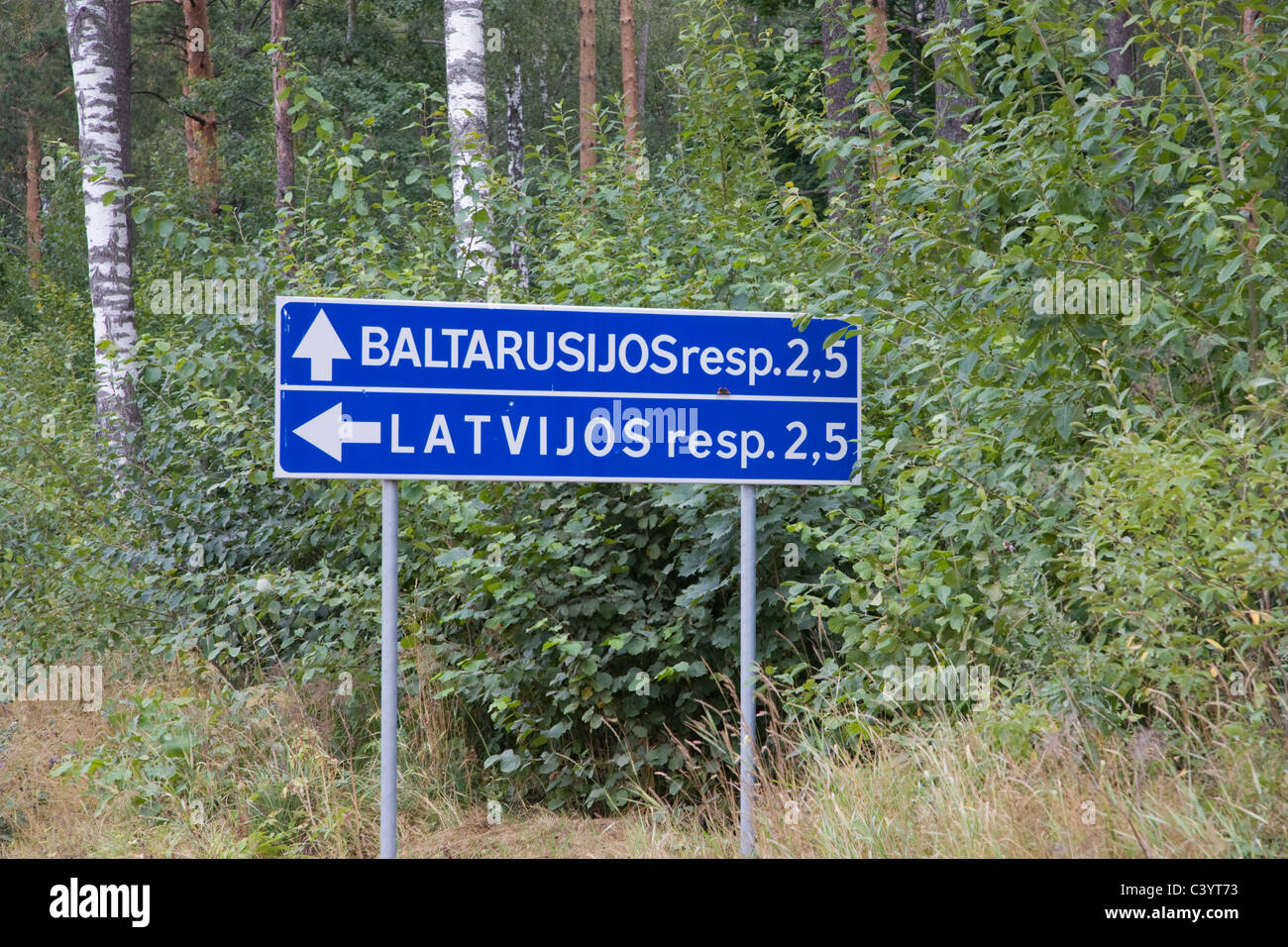 Direction traffic sign in Lithuania near Latvian and Belarus state border. Lithuania. Stock Photo
