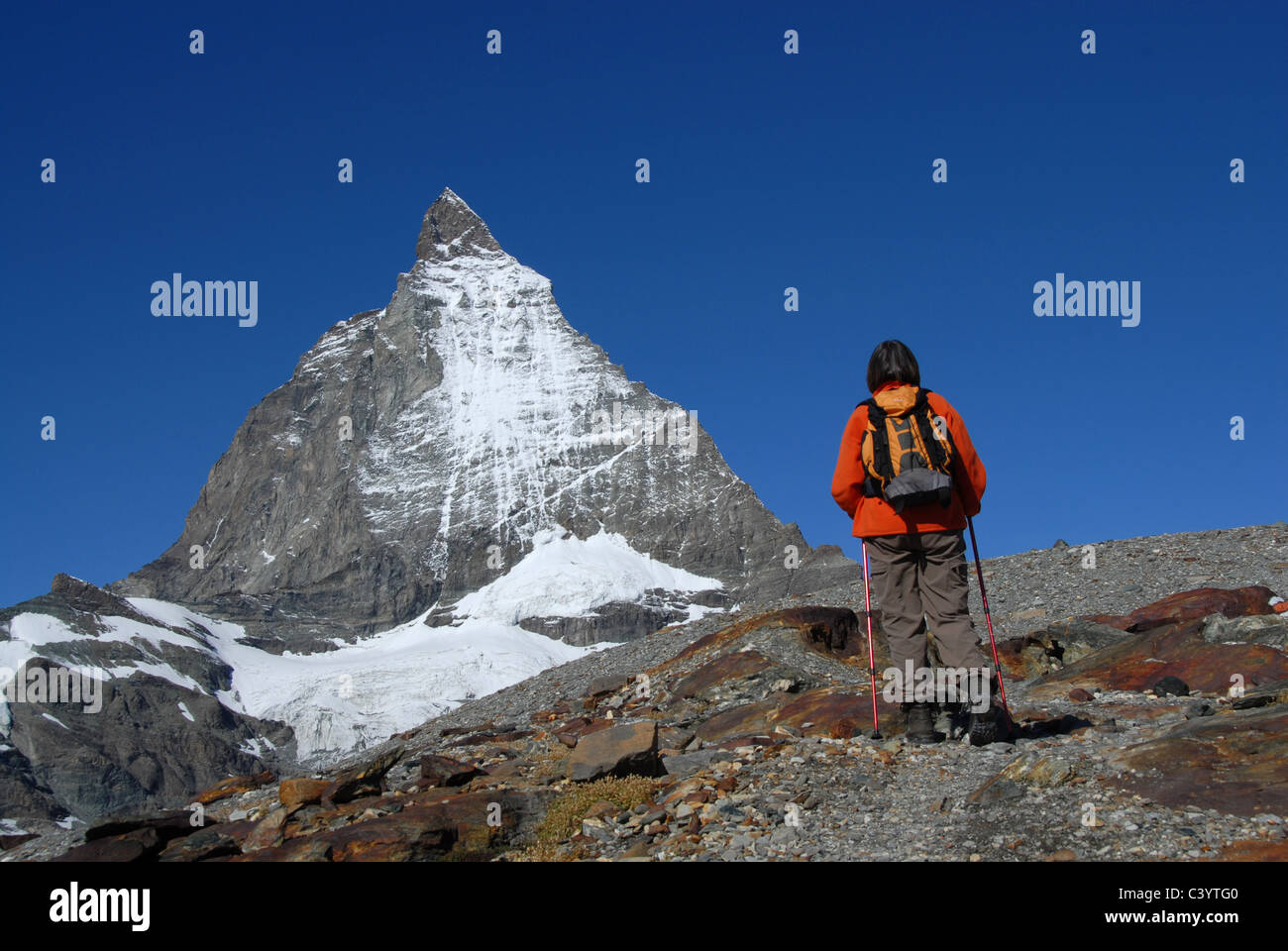 Matterhorn, Zermatt, Valais, mountain, hiker, woman, Female, Feminine, glaciers, nightmares, Alps, Swiss, Switzerland, blue, sky Stock Photo
