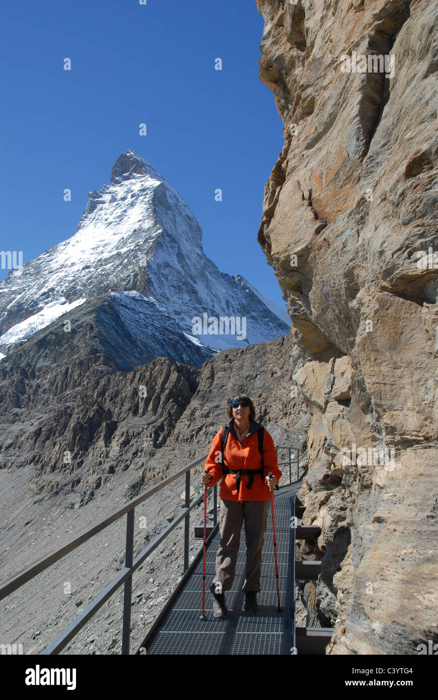 Matterhorn, Zermatt, Valais, mountain, hiker, woman, Hornli, hut, Alps, Swiss, Switzerland, blue, sky, walking, hiking, mountain Stock Photo