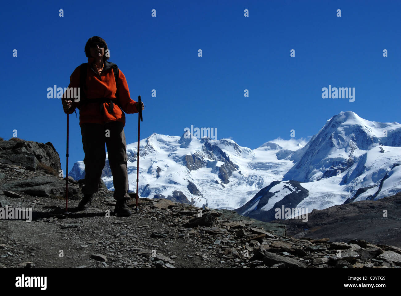 Matterhorn, Zermatt, Valais, mountain, hiker, woman, Hornli, hut way, Alps, Swiss, Switzerland, blue, sky, walking, hiking, moun Stock Photo