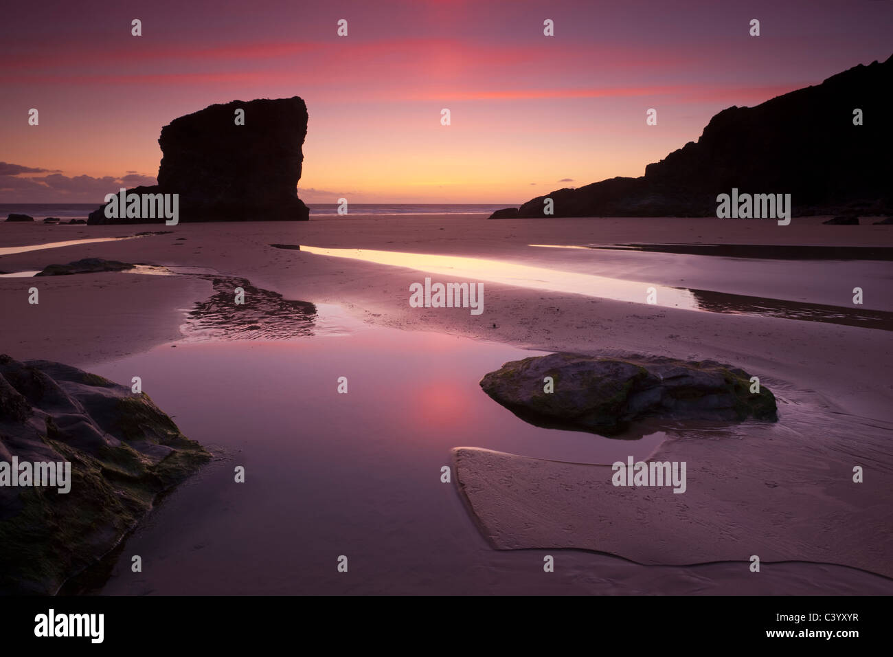 Twilight on the sandy beach at Bedruthan Steps, North Cornwall, England. Spring (May) 2011. Stock Photo