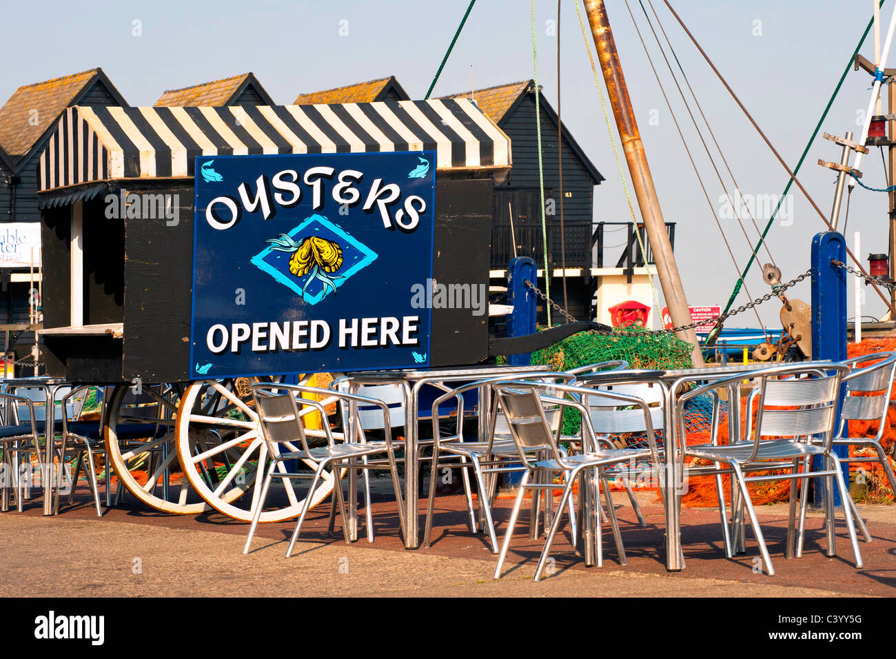 Oyster stall on the quayside at Whitstable Harbour in Kent, famous for