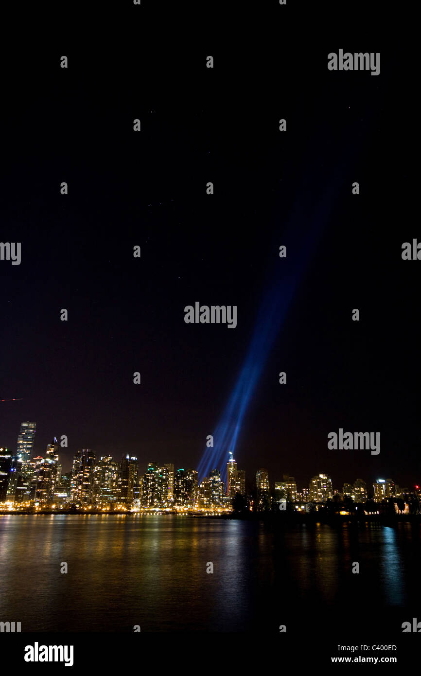 Powerful spotlights behind Vancouver west end during the 2010 Winter Olympic Games, Vancouver, Canada. Stock Photo