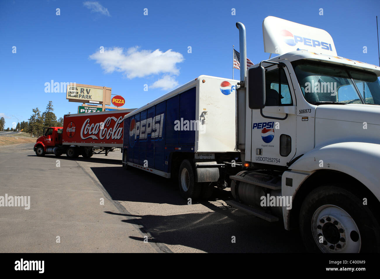 Pepsi and Coca-Cola lorries in an RV Park in Arizona, USA Stock Photo