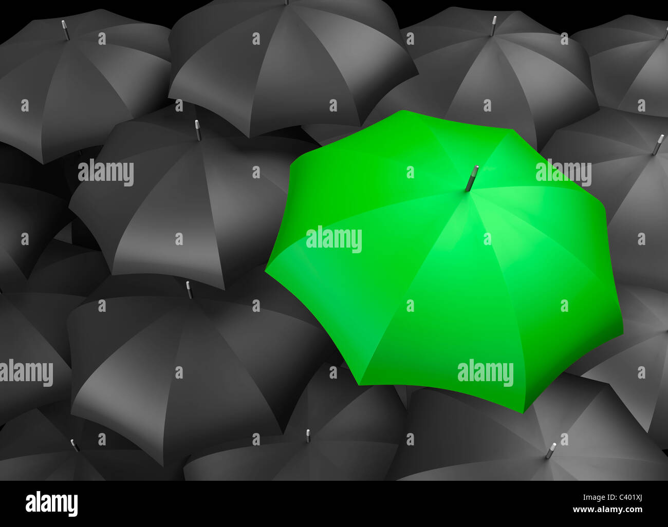 Green umbrella standing out from background of black umbrellas Stock Photo Alamy