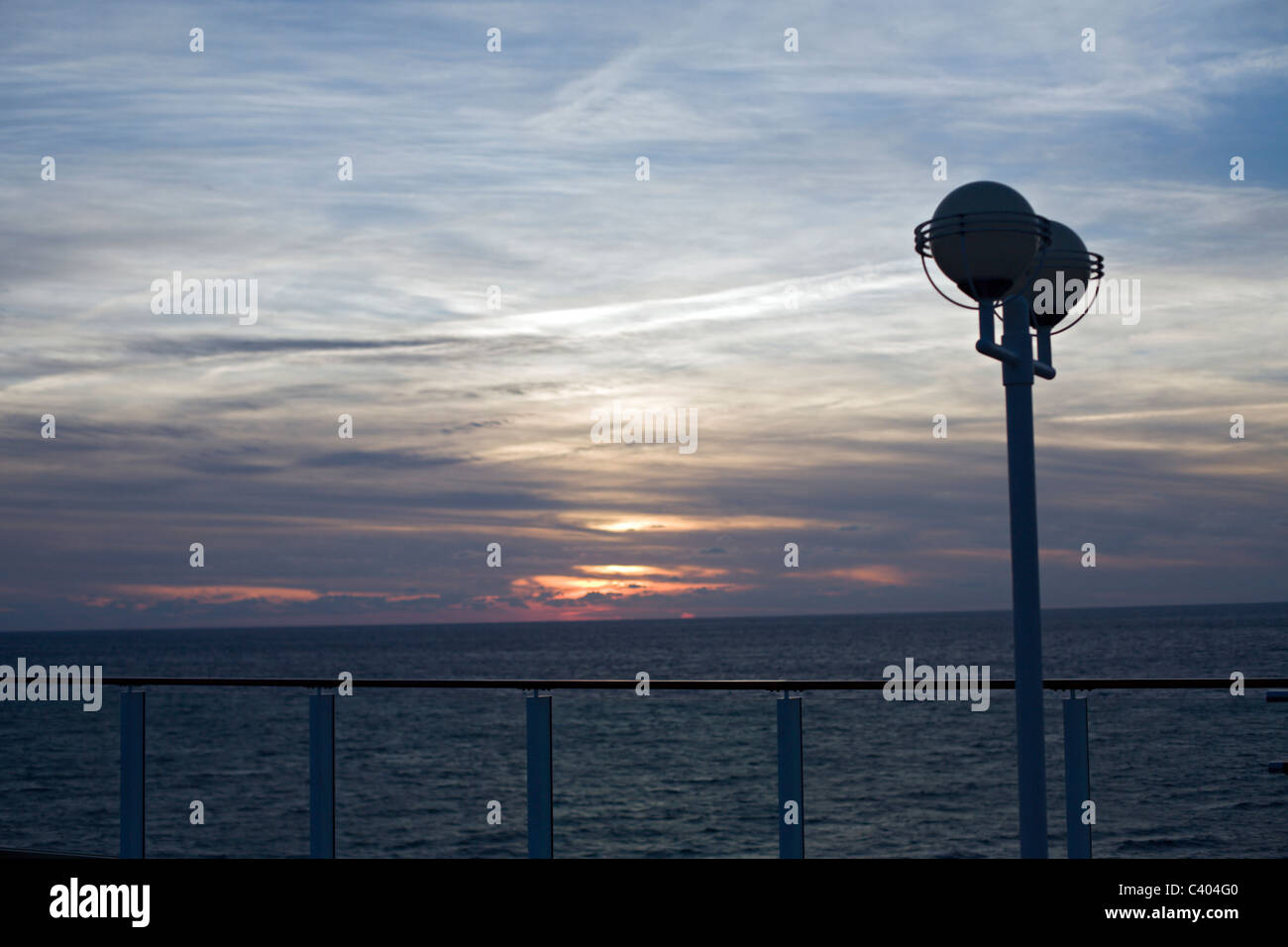 Sunset from a cruise ship Stock Photo - Alamy