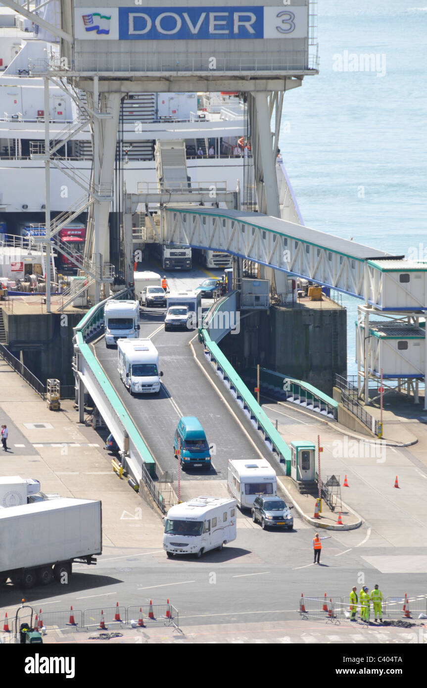 Vehicles disembarking DFDS cross channel ferry at Dover ferry terminal ...