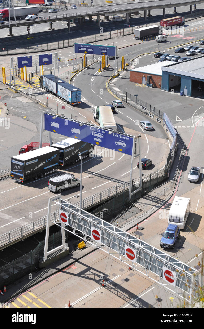 Vehicle entry and exit routes and signs within Dover ferry terminal Stock Photo