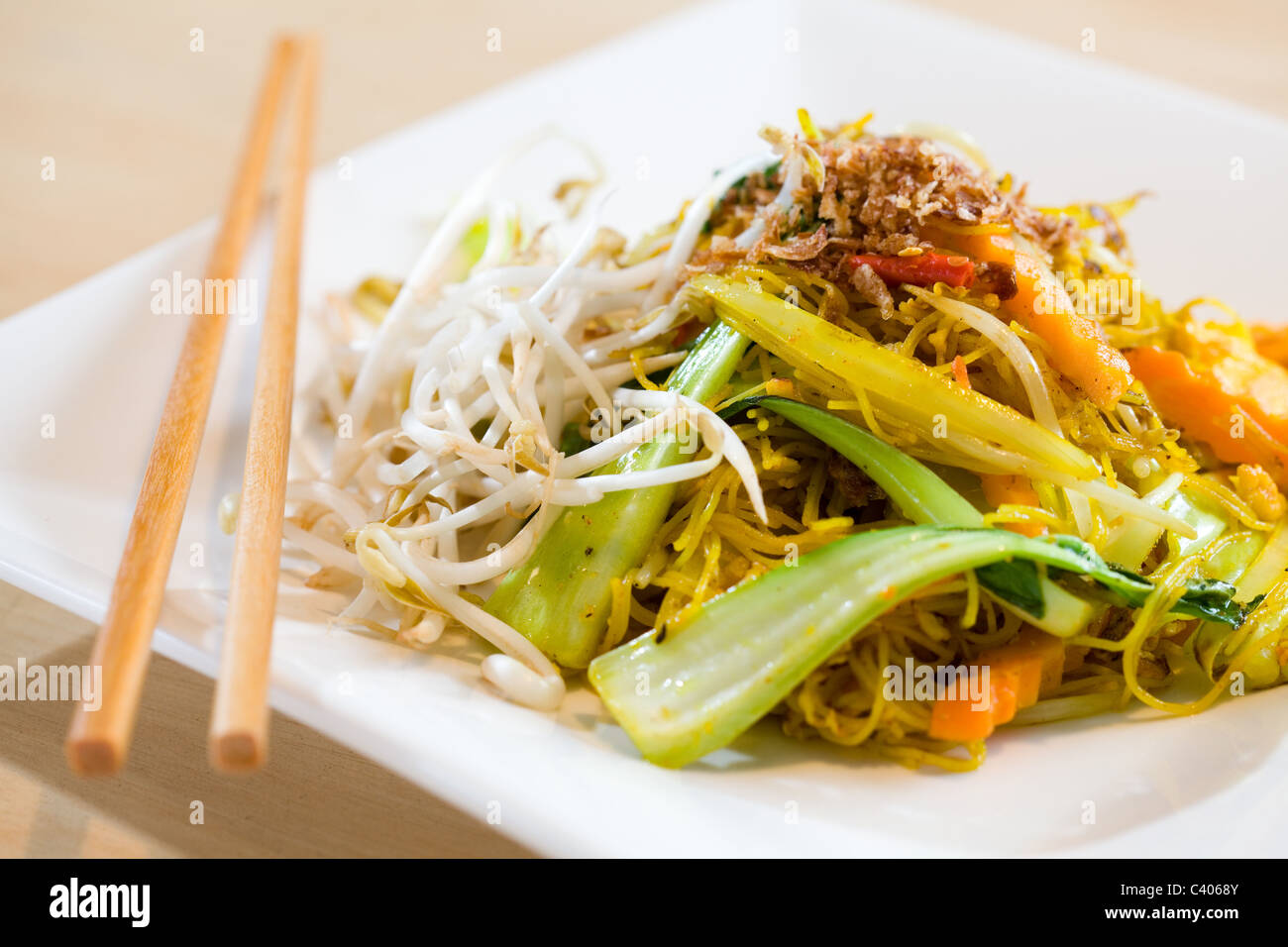 Thai Singapore style stir fried noodles Stock Photo