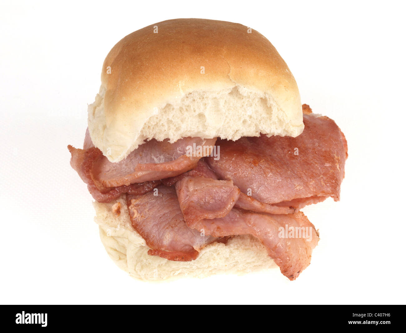 Fresh Tasty Traditional Bacon Breakfast Roll Isolated Against A White