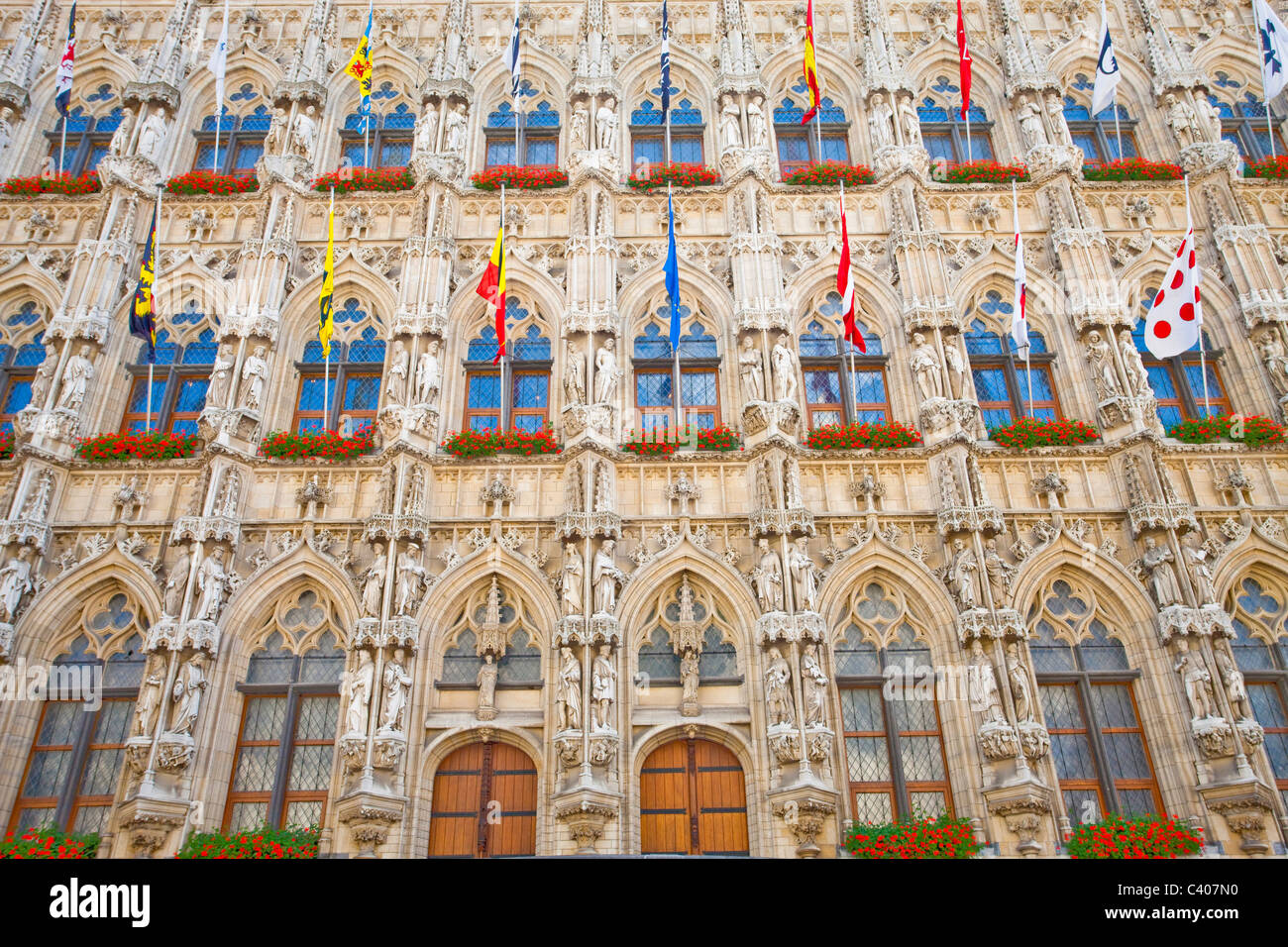 Belgium, Europe, Leuven, city hall, facade, Gothic, flags Stock Photo