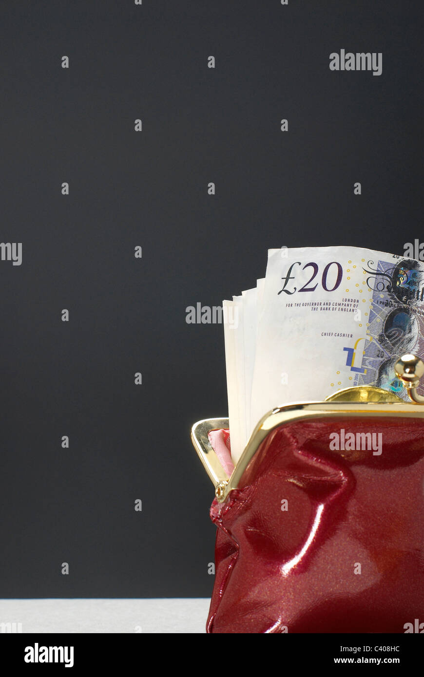 Purse with pound notes in it Stock Photo - Alamy