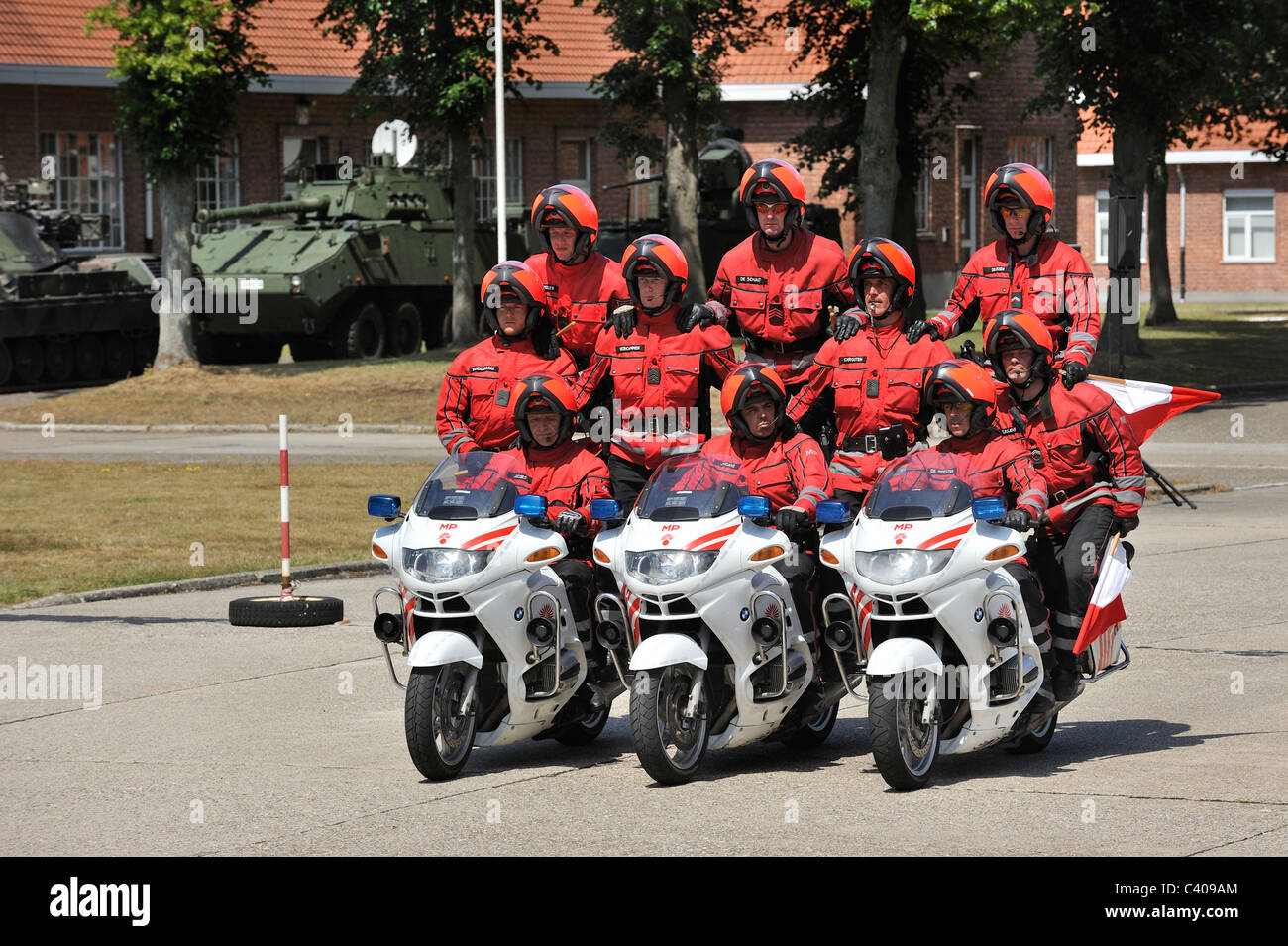 Demonstration of the Belgian Military Police on motorbikes during open day of the Belgian army at Leopoldsburg, Belgium Stock Photo