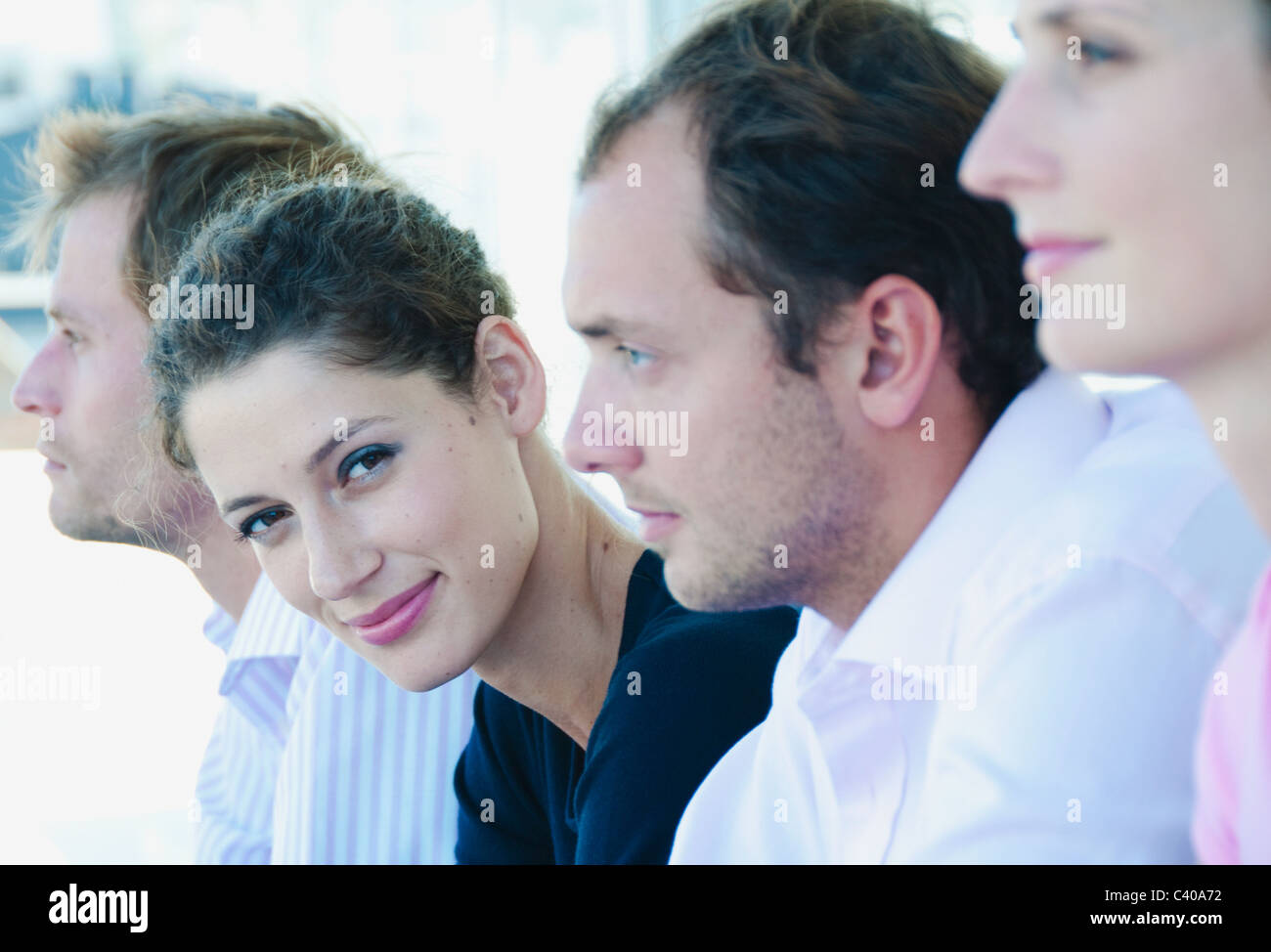 Portrait of woman in line up Stock Photo
