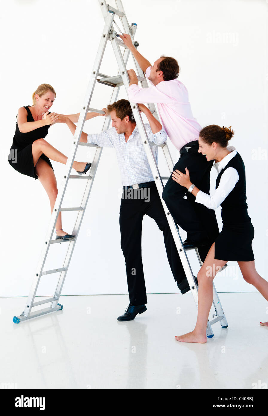 Team fight on reach top of ladder Stock Photo