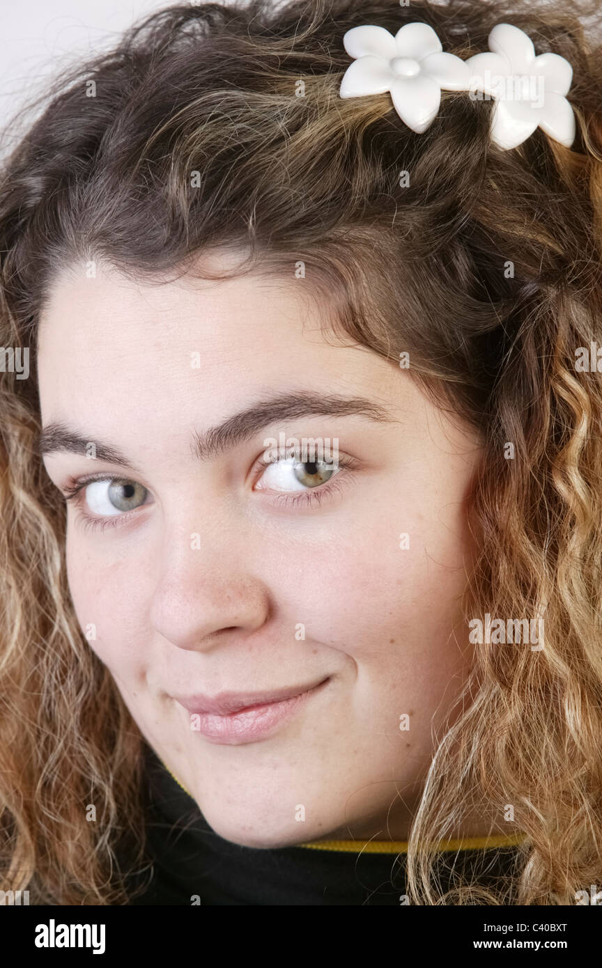 Portrait of young woman smiling Stock Photo - Alamy