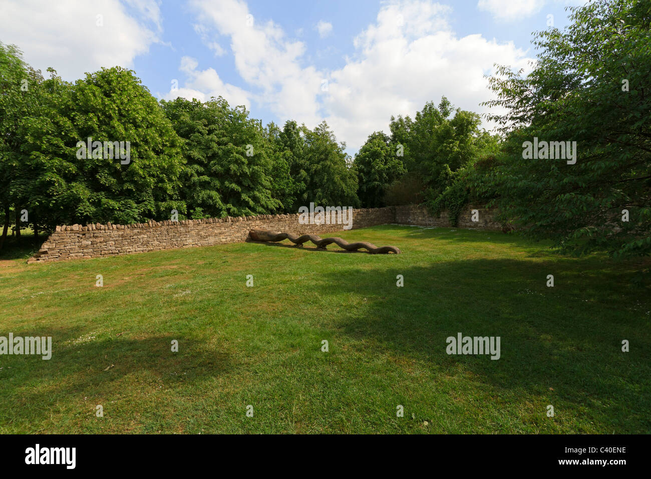 Contemporary Sculpture Garden at Burghley House. Wood sculpture in the