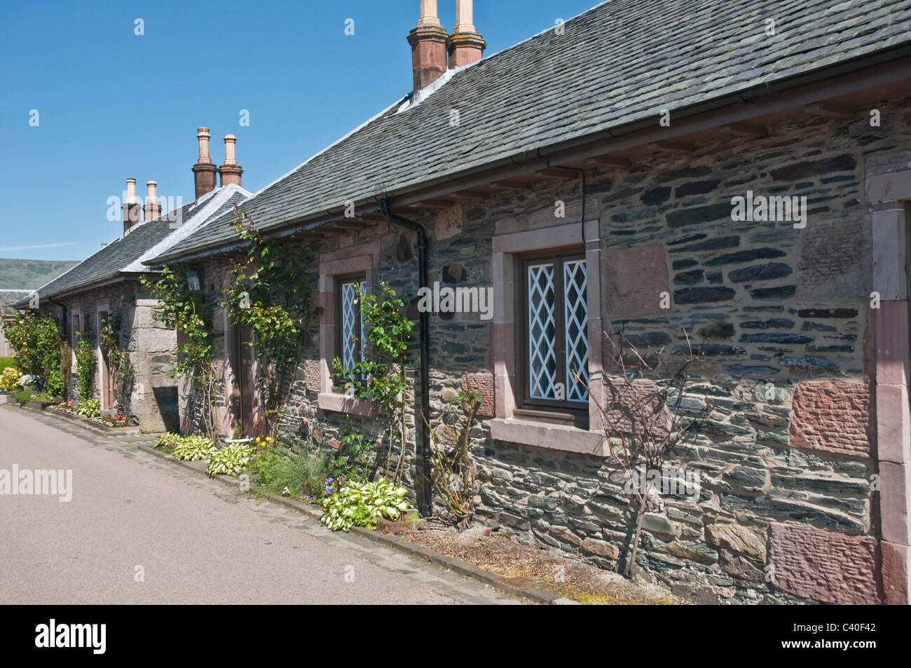 Cottages in Luss beside Loch Lomond Argyll & Bute Scotland Stock Photo