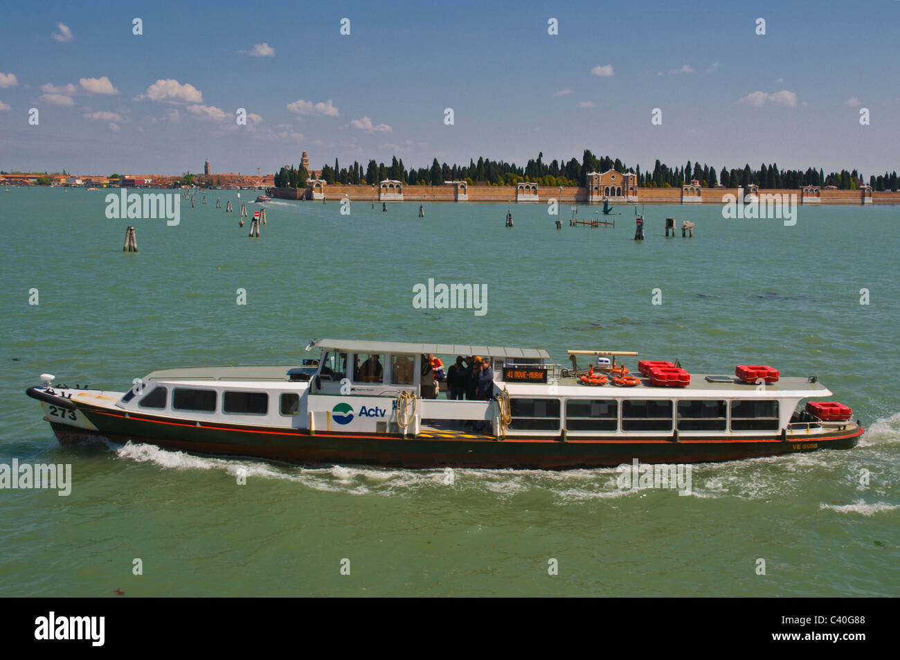 Vaporetti water bus in front of San Michele cemetery island Venice Italy Europe Stock Photo